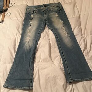 Women's Distressed Blue Jeans